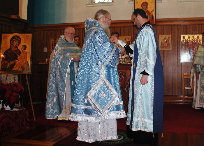 Photo: 20 - Putting on Right Cuff | Ordination of Dn Anthony Mansour ...